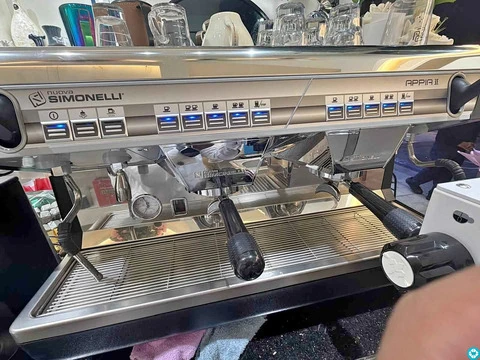 Coffee machine with grinder