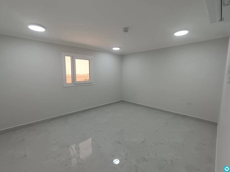 For rent, a building in Al-Khor, 13 apartments, and parking spaces. - 4/8