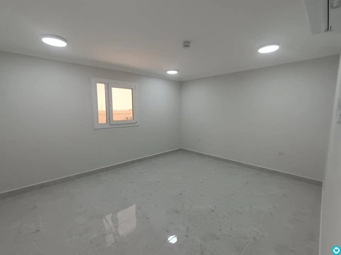 For rent, a building in Al-Khor, 13 apartments, and parking spaces. - 4