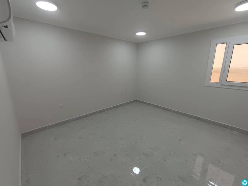 For rent, a building in Al-Khor, 13 apartments, and parking spaces. - 5/8