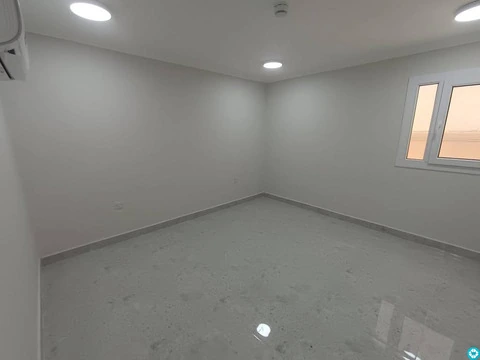For rent, a building in Al-Khor, 13 apartments, and parking spaces. - 5