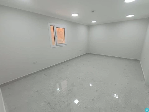 For rent, a building in Al-Khor, 13 apartments, and parking spaces. - 6