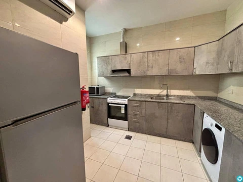 For rent in Al-Khaisa area, brand new apartments, newly built, near Al Meera.